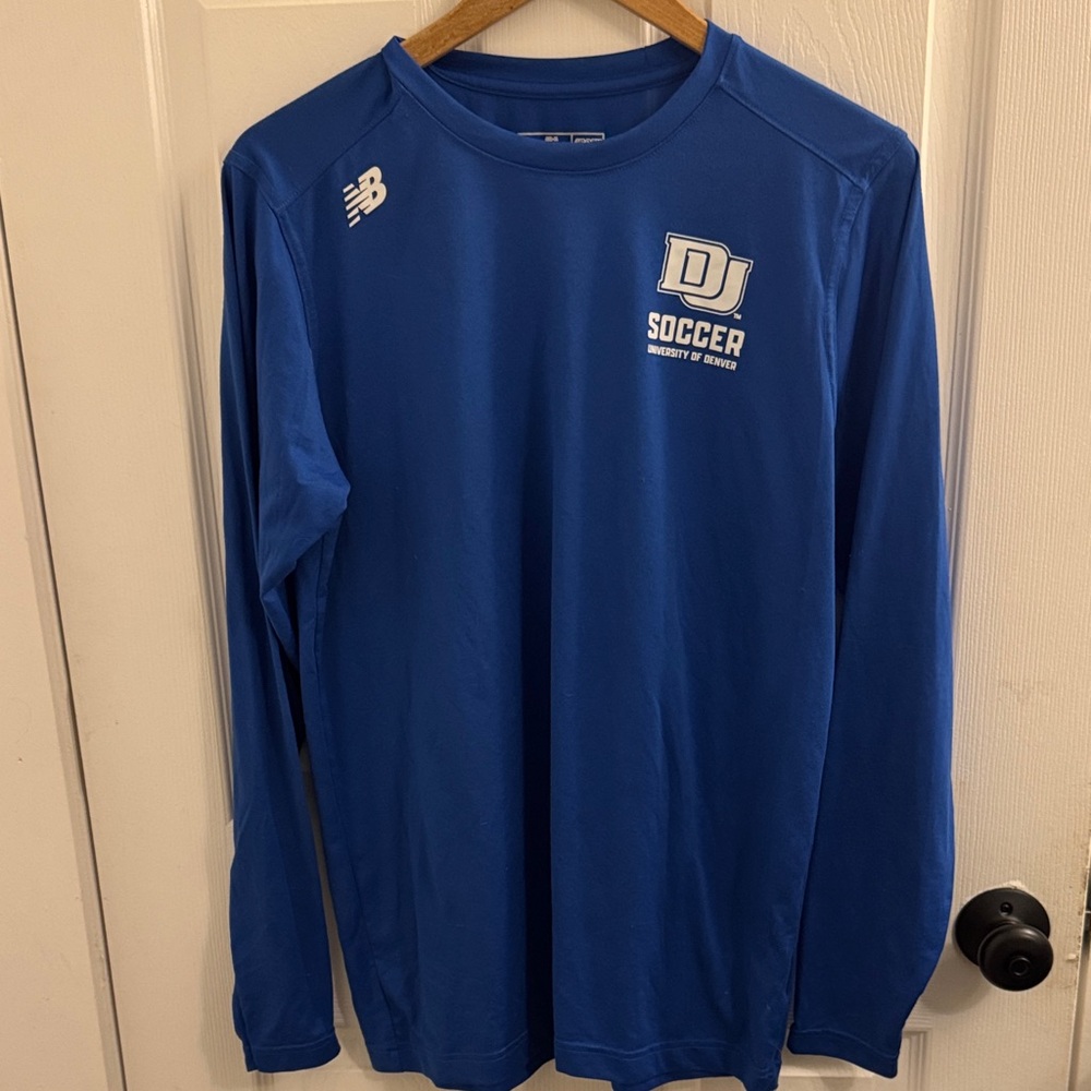 Official university of Denver men’s soccer training shirt by new balance